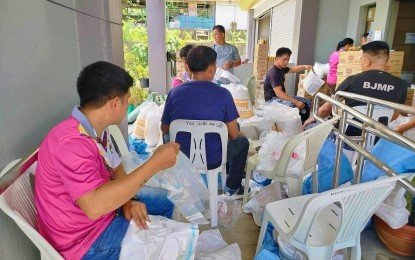 apayao-government-workers-prepare-food-stock